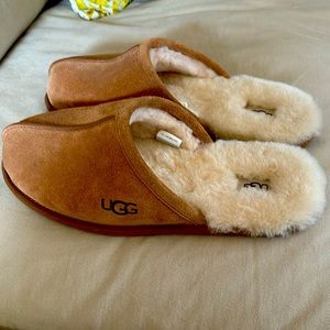 Uggs men’s slippers.  Brand New without tags.  Never worn as shown in pictures.
